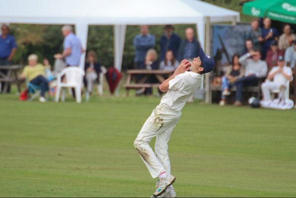 the moment a cricketer takes the high catch in the field