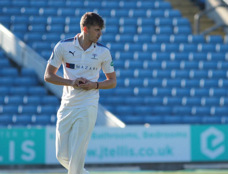 Ben Coad bowls for Yorkshire
